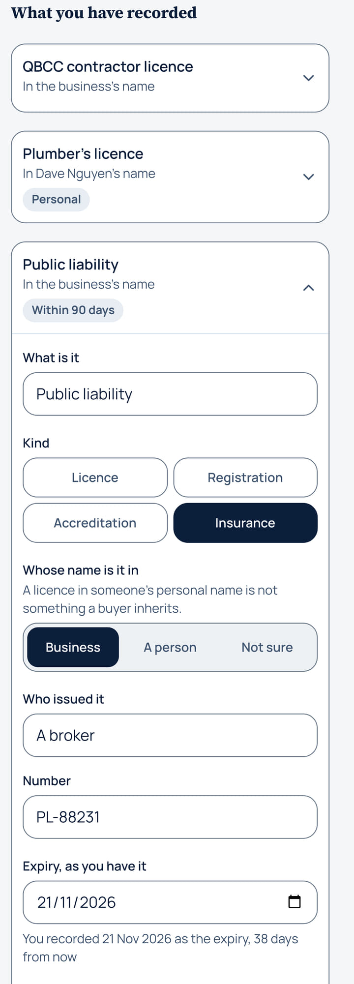 The Licences and Insurance register on a phone. The public liability policy is open, showing whose name it is in, who issued it, its number and the expiry date as the owner has it.